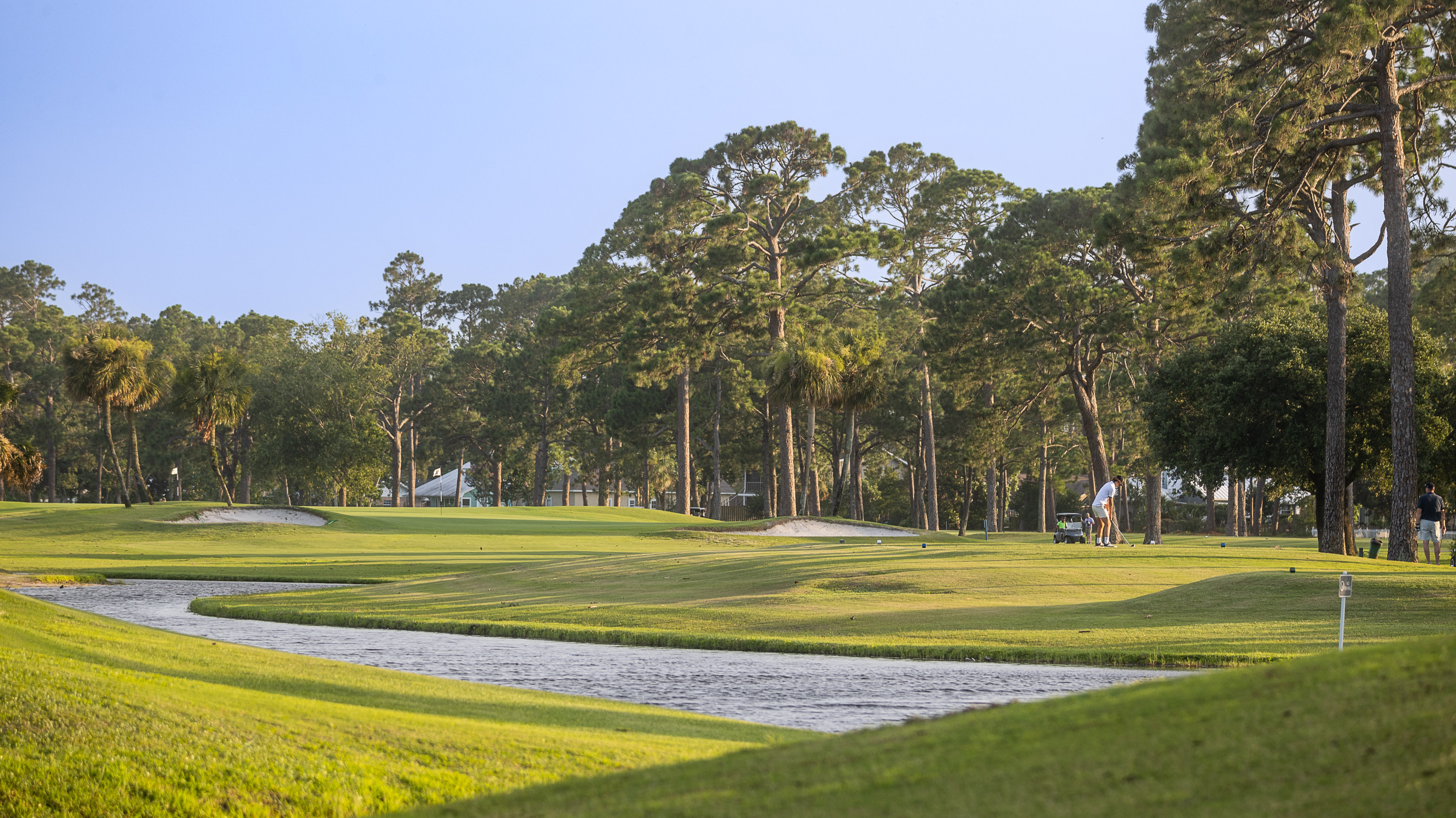Golfers playing the Legacy Golf Club Championship Course